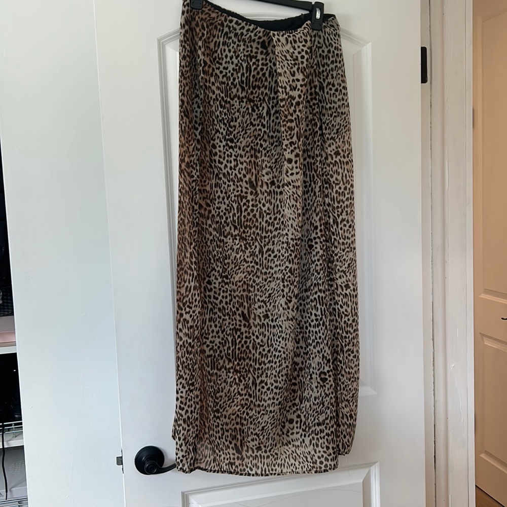 Sheer leopard skirt with slit and built in shorts size M